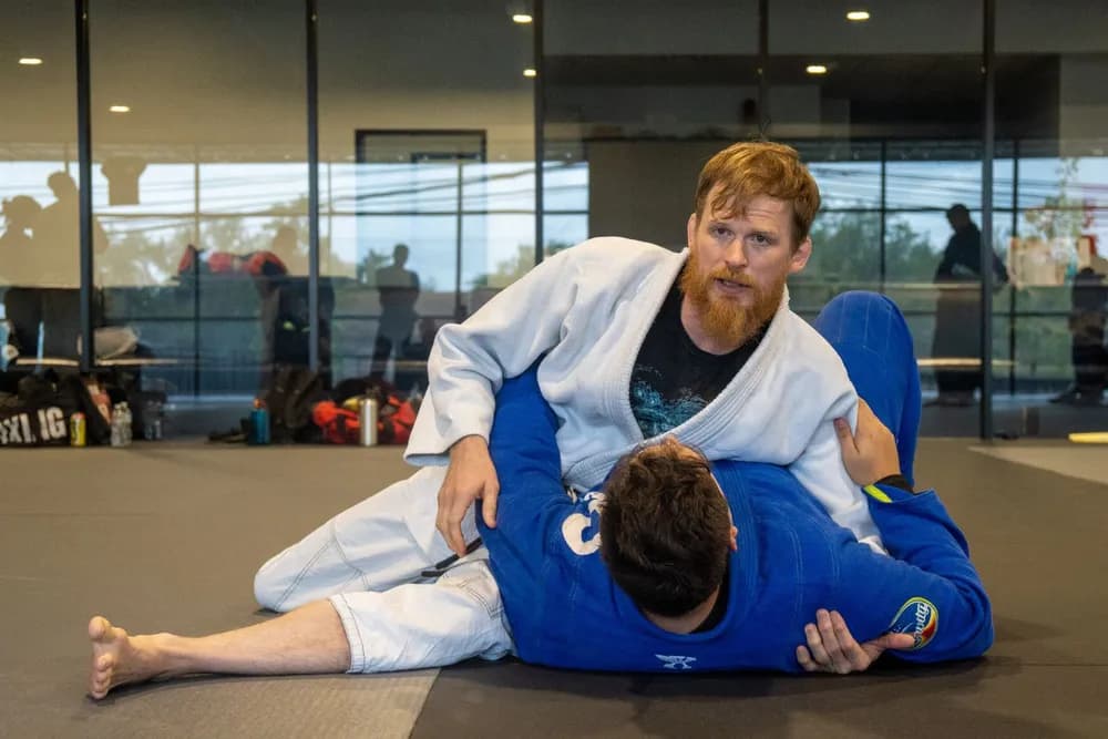 Action shot of two BJJ students